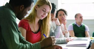 Black and white students taking ielts listening test